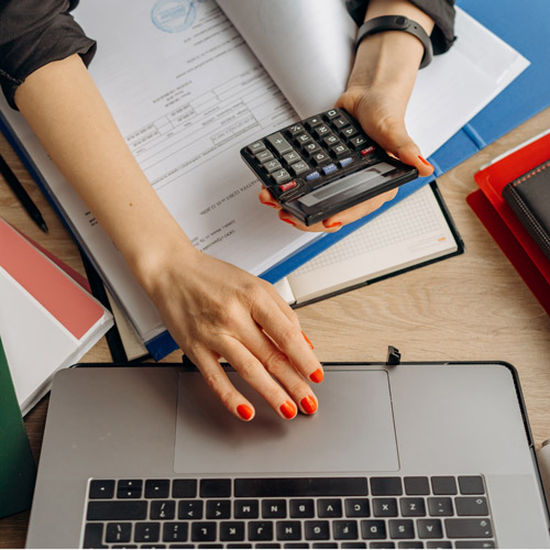 women goes through her finance documents as she prepares for financial disclosure for separation process with her partner