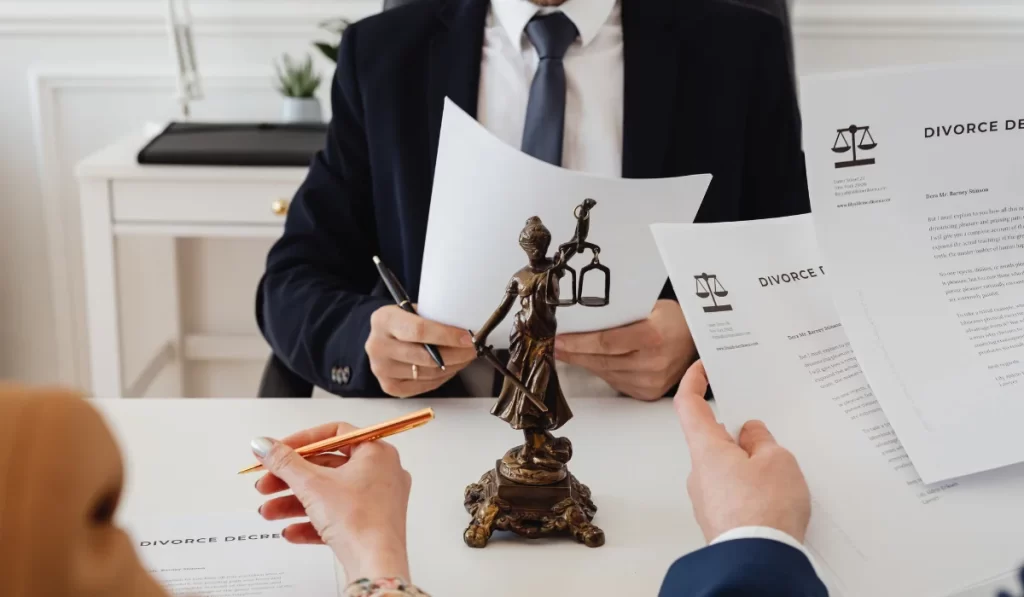 Couple passing documents or divorce